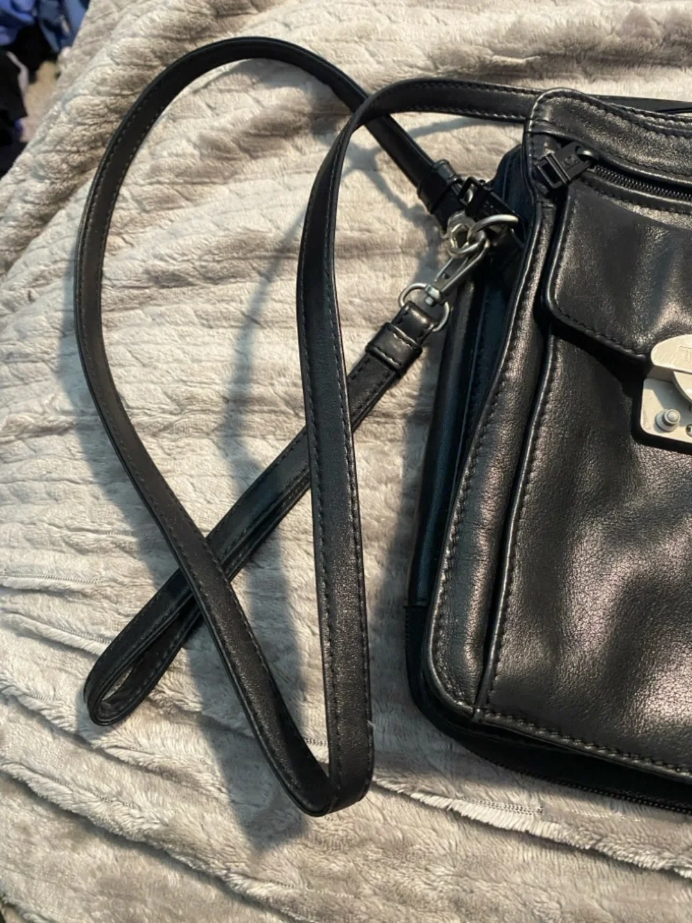TUMI Black Leather Messenger Bag with Silver Hardware
